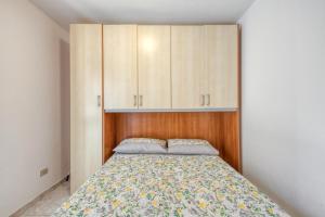 Una cama o camas en una habitación de Salentina