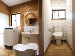 a bathroom with a toilet and a sink at Forest Waltz - Vacation STAY 26221v in Komoro +15 photos