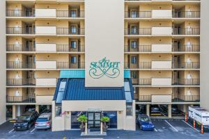 an apartment building with the olympics sign on it at The Summit #9E - Oceanfront in Myrtle Beach