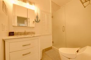 a white bathroom with a sink and a toilet at 1000#1 Contemporary Home w/ Parking, Grill, & AC! in Newport Beach +56 photos