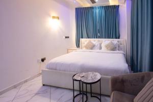 Katil atau katil-katil dalam bilik di Deluxe Studio Apartment, East Airport