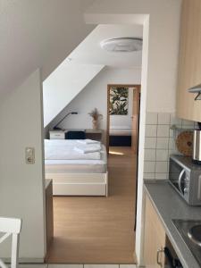 Ένα ή περισσότερα κρεβάτια σε δωμάτιο στο Stadtnahe Wohnung am Wiesengrund +5 φωτογραφίες