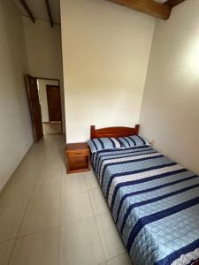 Letto o letti in una camera di Casa Lisieux- Jericó