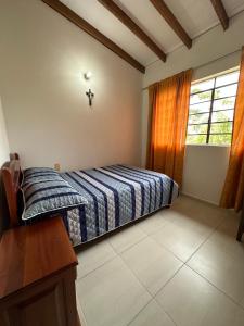 Letto o letti in una camera di Casa Lisieux- Jericó