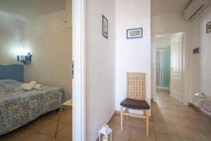 Postel nebo postele na pokoji v ubytování Villa Onda Marina 100 meters from sea - Happy Rentals + 12 fotografií