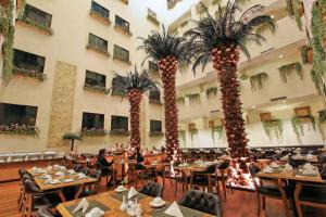 Εστιατόριο ή άλλο μέρος για φαγητό στο Harmoni Suites Hotel