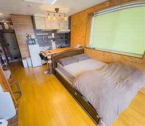 Kuchyň nebo kuchyňský kout v ubytování Wivic Awase 4th floor - Vacation STAY 33360v + 2 fotografie