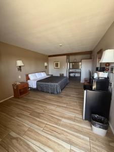 Letto o letti in una camera di Torch Lite Lodge