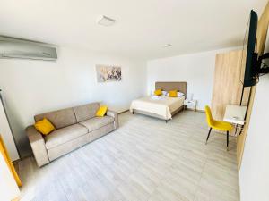 Postel nebo postele na pokoji v ubytování A&A Apartments