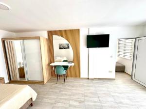 TV a/nebo společenská místnost v ubytování A&A Apartments
