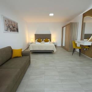 Postel nebo postele na pokoji v ubytování A&A Apartments