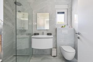 Kúpeľňa v ubytovaní Penthouse Apartments Dora Kukljica