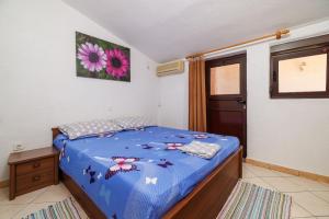 Postel nebo postele na pokoji v ubytování Apartments Jase