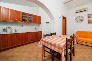 Kuchyň nebo kuchyňský kout v ubytování Apartments Jase