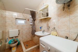 Kúpeľňa v ubytovaní Apartment Toma + 37 fotografií