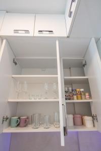 Kuchyň nebo kuchyňský kout v ubytování Apartman TRI KRALJA 2