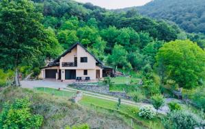 a house on the side of a hill at Holiday Home Ajaz Bihac in Bihać