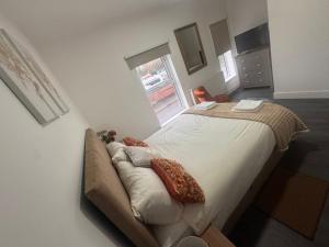 a bedroom with a large bed in a room at Liverpool RD Warrington in Great Sankey
