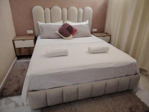 Ένα ή περισσότερα κρεβάτια σε δωμάτιο στο Fabuleux Appartement à Agadir
