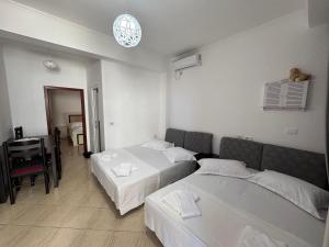 Letto o letti in una camera di Hotel Barjami
