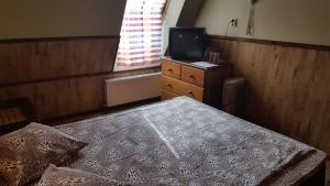 Postel nebo postele na pokoji v ubytování Strops