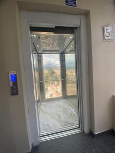 an empty room with a large window in a building at Los ROYALS Hotel Huaraz in San Antonio +1 photo