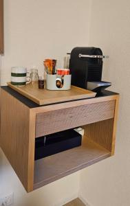 a wooden counter top with aounter at Ferienwohnung GreenLook - Ferien am Lungernsee in Bürglen