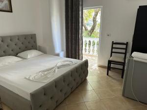 Voodi või voodid majutusasutuse Hotel Rixhi toas