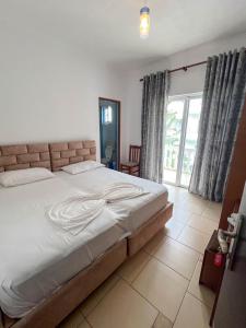 Voodi või voodid majutusasutuse Hotel Rixhi toas