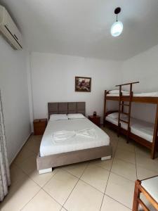 Voodi või voodid majutusasutuse Hotel Rixhi toas