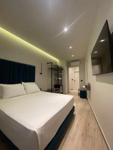 A bed or beds in a room at The cosy inn vlora