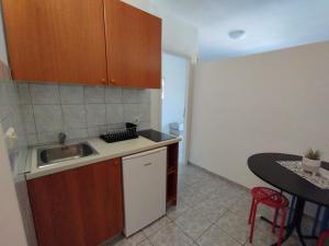 Kuchyň nebo kuchyňský kout v ubytování Apartments with parking spaces Orebic, Peljesac - 643