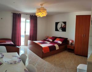 Postel nebo postele na pokoji v ubytování Apartments with parking spaces Orebic, Peljesac - 643