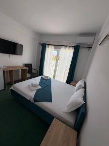 En eller flere senge i et værelse på Sunrise Boutique + 60 billeder