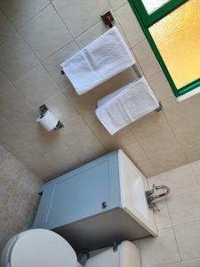 Koupelna v ubytování Hospedaje Castillo + 39 fotografií