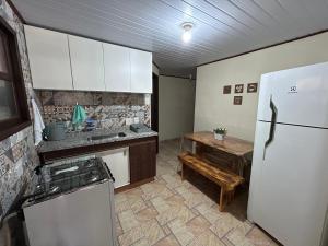 Dapur atau dapur kecil di Sítio recanto toca da onça