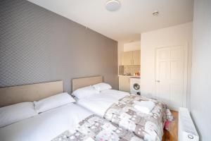 Postel nebo postele na pokoji v ubytování Brick Hotel