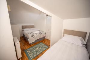 Postel nebo postele na pokoji v ubytování Brick Hotel