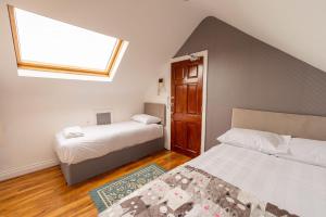 Postel nebo postele na pokoji v ubytování Brick Hotel