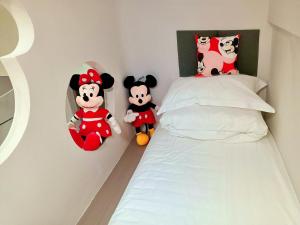 Llit o llits en una habitació de PingTan YuCheng Seaview Blue Smart Hotel