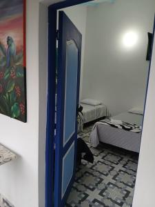 Postel nebo postele na pokoji v ubytování Vista Farallones Hostel