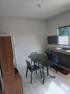 Μια τηλεόραση ή/και κέντρο ψυχαγωγίας στο Apartamento na área central da cidade