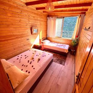 Postel nebo postele na pokoji v ubytování Hotel nabil