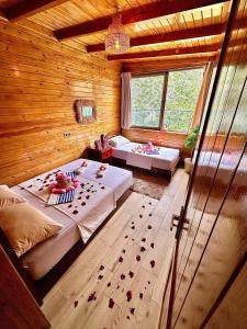 Postel nebo postele na pokoji v ubytování Hotel nabil