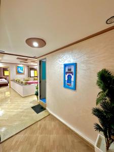 TV a/nebo společenská místnost v ubytování Hotel nabil