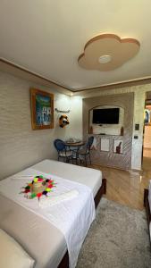 Postel nebo postele na pokoji v ubytování Hotel nabil