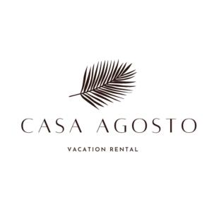 a palm leaf logo on a white background at Surfers bungalow 5 min walk to the beach in Tamarindo
