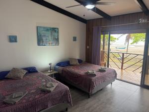 Postel nebo postele na pokoji v ubytování Casa Nova at La Escapadita