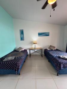 Postel nebo postele na pokoji v ubytování Casa Nova at La Escapadita