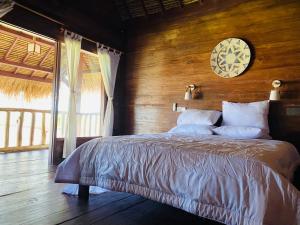 Postel nebo postele na pokoji v ubytování Living On Air